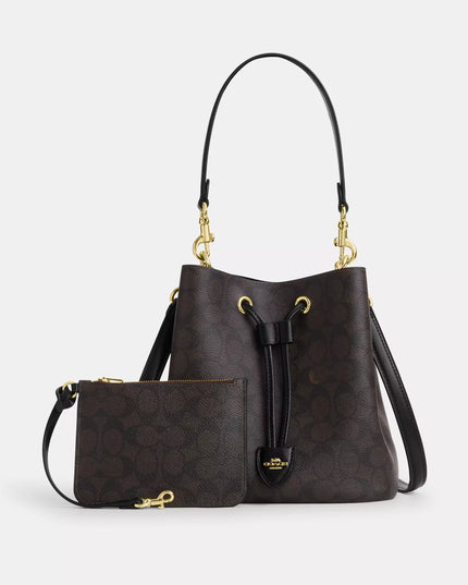 Rowan Bucket Bag In Signature Canvas