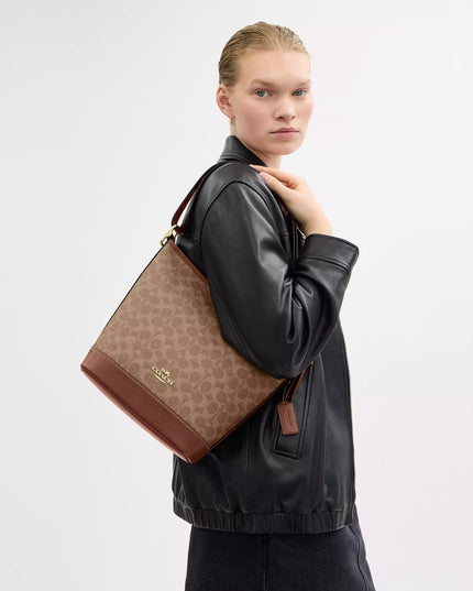 Jude Duffle Bag In Signature Canvas